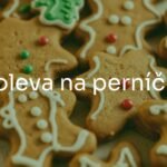 Decorated gingerbread cookies with white icing, festive, holiday baking, cozy Christmas atmosphere, traditional, realistic.